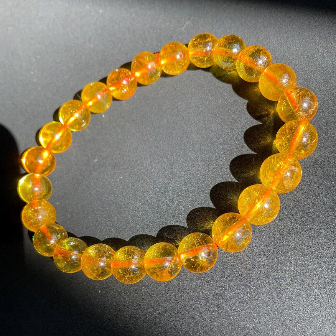 Attract abundance, prosperity, and positive energy with our handcrafted Natural Citrine Bracelet. Known as the “Merchant’s Stone,” Citrine is renowned for its power to draw wealth, success, and joyful energy, making it an excellent tool for manifestation and goal achievement.
Crafted with 8mm polished citrine beads, this bracelet activates the Solar Plexus Chakra, promoting confidence, clarity, and inner strength. Its vibrant yellow hue adds a touch of warmth to any outfit, making it perfect for everyday w