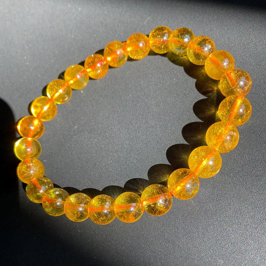 Attract abundance, prosperity, and positive energy with our handcrafted Natural Citrine Bracelet. Known as the “Merchant’s Stone,” Citrine is renowned for its power to draw wealth, success, and joyful energy, making it an excellent tool for manifestation and goal achievement.
Crafted with 8mm polished citrine beads, this bracelet activates the Solar Plexus Chakra, promoting confidence, clarity, and inner strength. Its vibrant yellow hue adds a touch of warmth to any outfit, making it perfect for everyday w